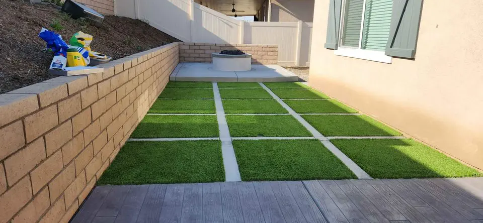 turf installed between concrete pavers to create a driveway in this residential property in Reno NV
