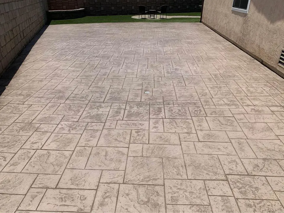 stamped concrete driveway in Reno, NV with personalized pattern by Reno Concrete Solutions