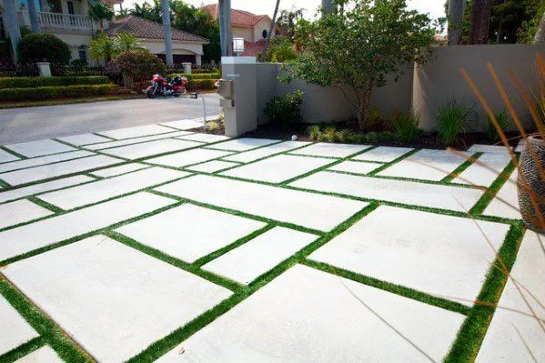 concrete and artificial grass driveway designed and installed by Reno Concrete Solutions in Genoa, NV