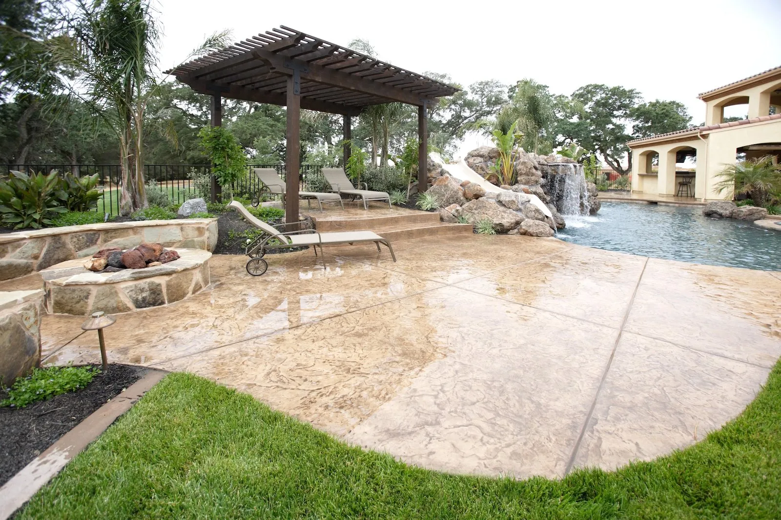 custom-design stamped concrete pool deck in Sparks, NV by Reno Concrete Solutions